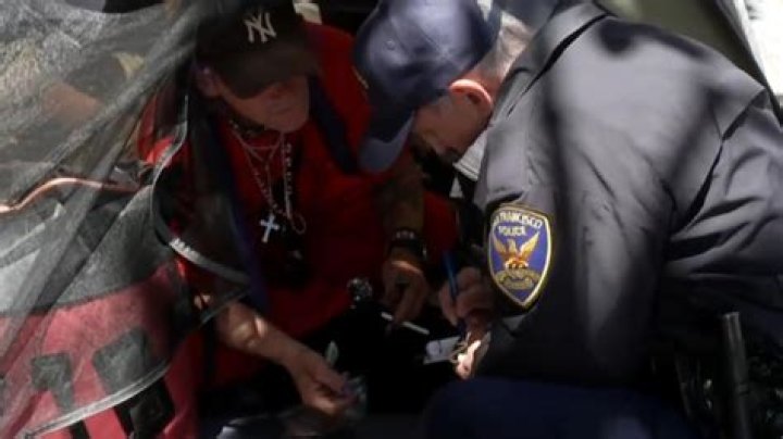 Arrest Warrant Issued for Art Gallery Owner Seen Hosing Down Unhoused Woman in San Francisco