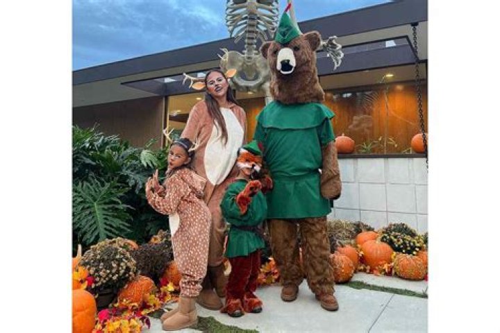 
John Legend and Pregnant Chrissy Teigen Match in ‘Furry Halloween’ Costumes with Luna and Miles 