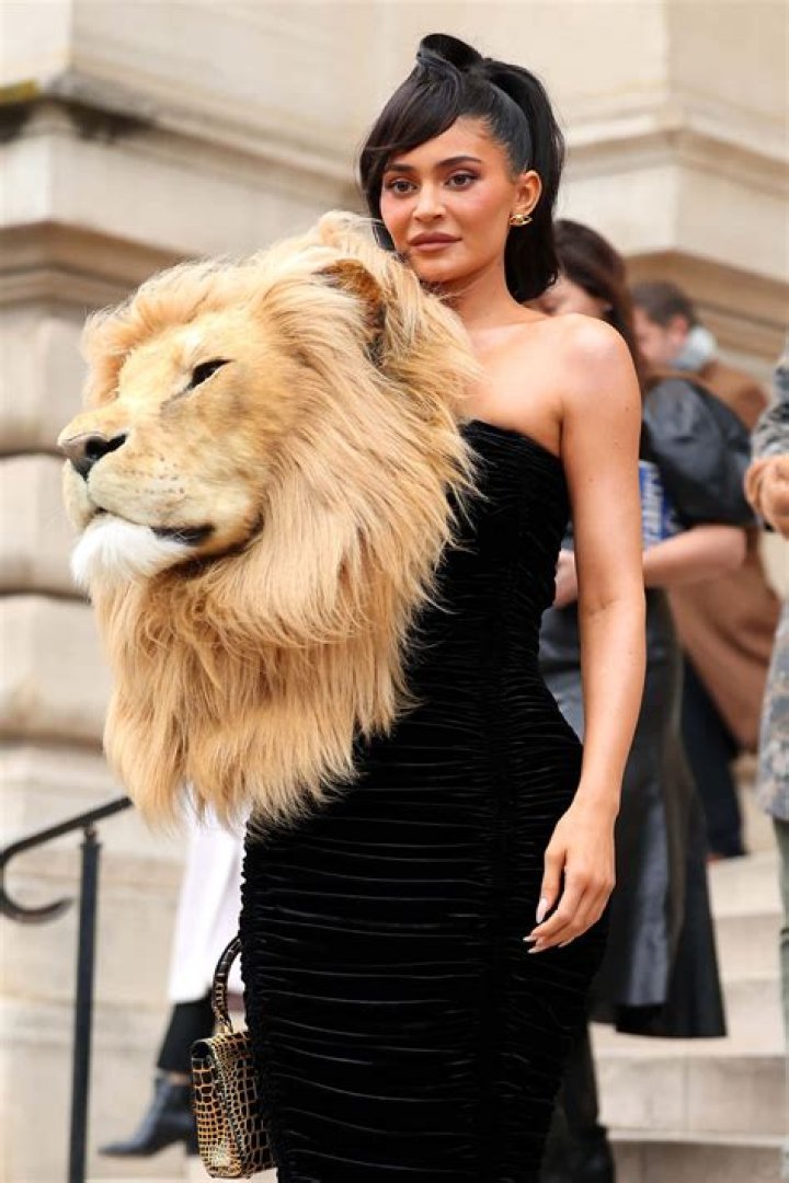 
Kylie Jenner Appears At Paris Fashion Week Wearing A Life-Sized Lion Head 